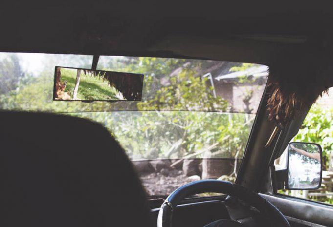 Rear view mirror dash cam – which is best? Car interior with rear view mirror on show for the rear view dashcam guide